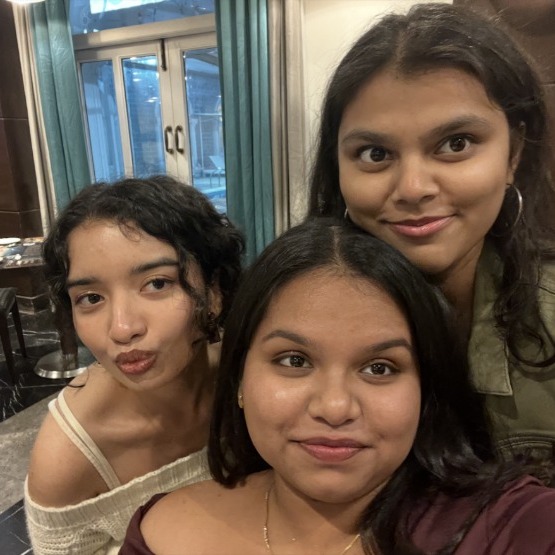 The three of us, leaning in